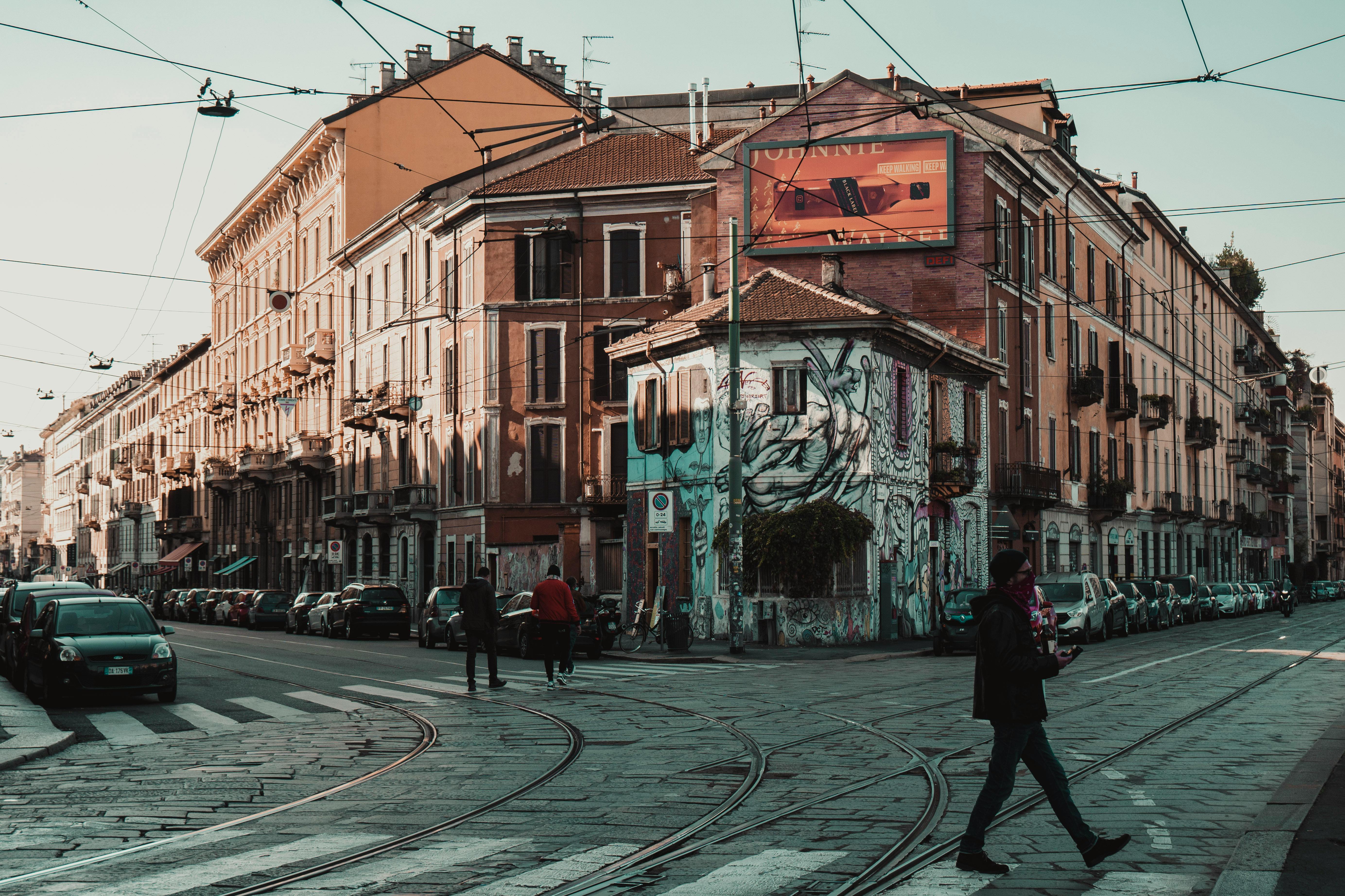 people walking on street near the buildings