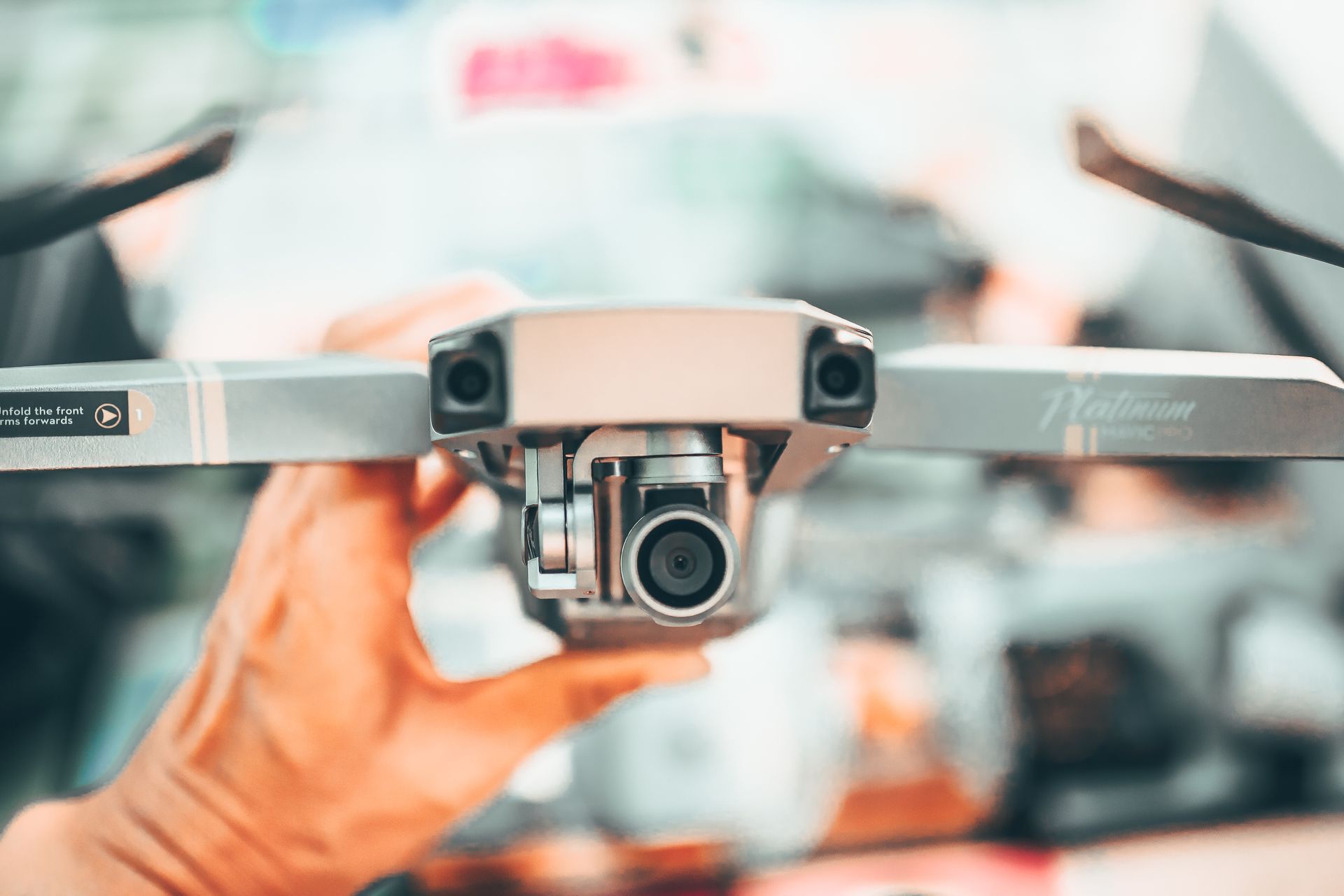 A professional operator with an enterprise grade drone against a city skyline
