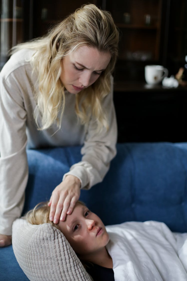 A Mother Caring For Her Sick Child