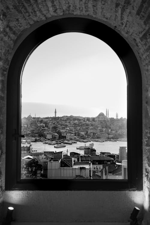 Grayscale Photo of City Buildings