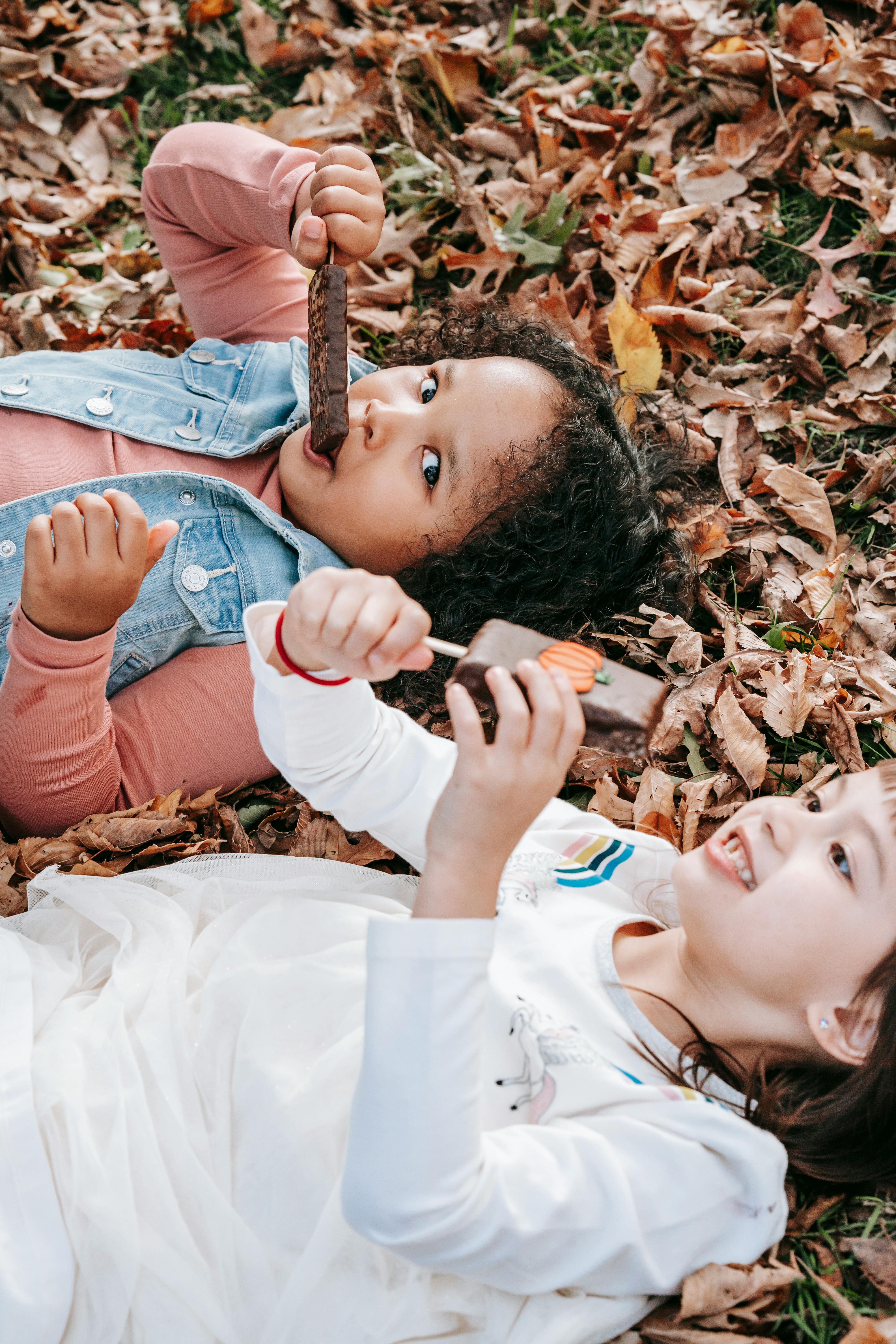 happy diverse children with gingerbread