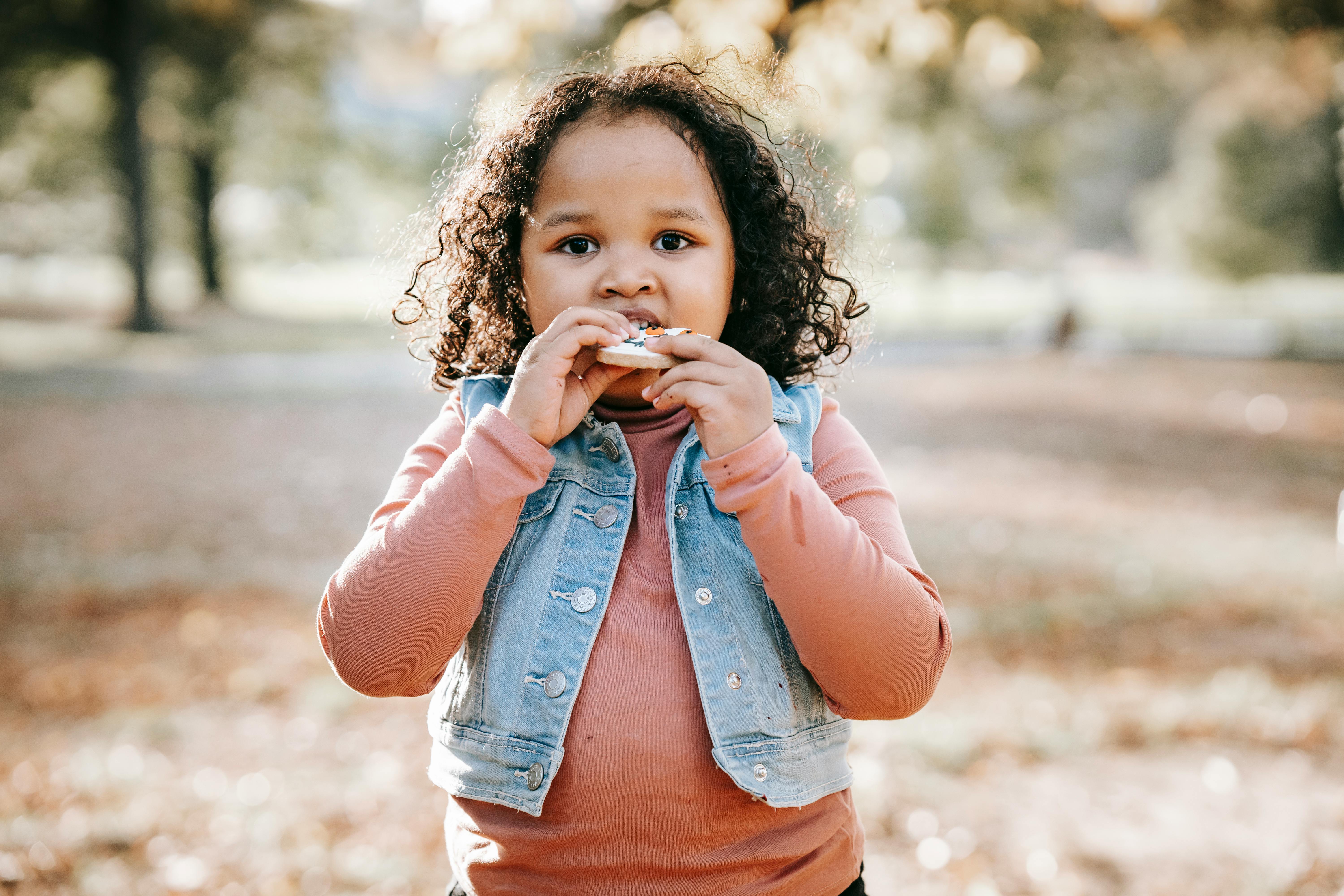 Cute little child with cookie