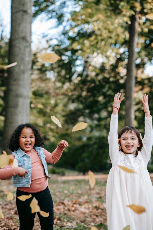 Kids Playing Near the Trees