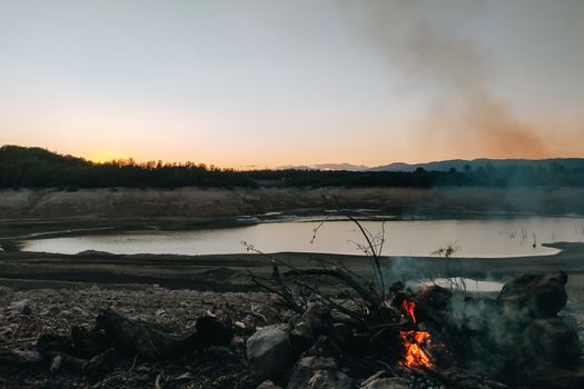 Bonfire Near a Pond Banks