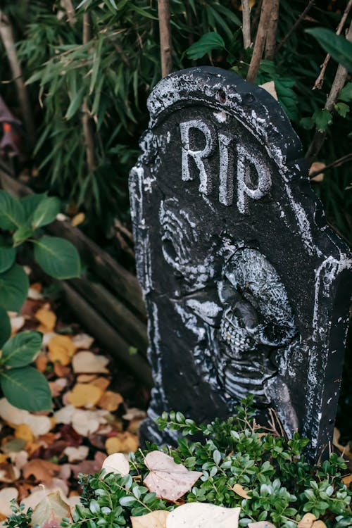 Fake gravestone placed as decoration for Halloween celebration
