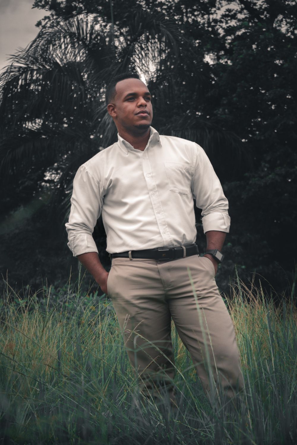Portrait of a Man Standing in a Field · Free Stock Photo