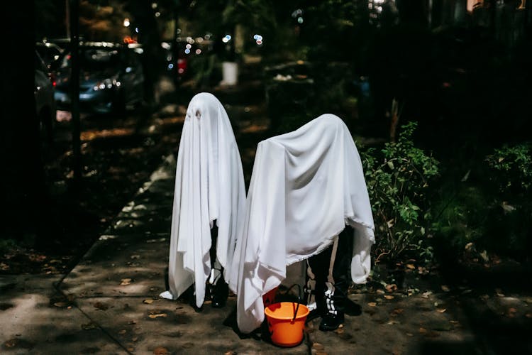 Faceless Kids In Phantom Costumes On Halloween Night In Town