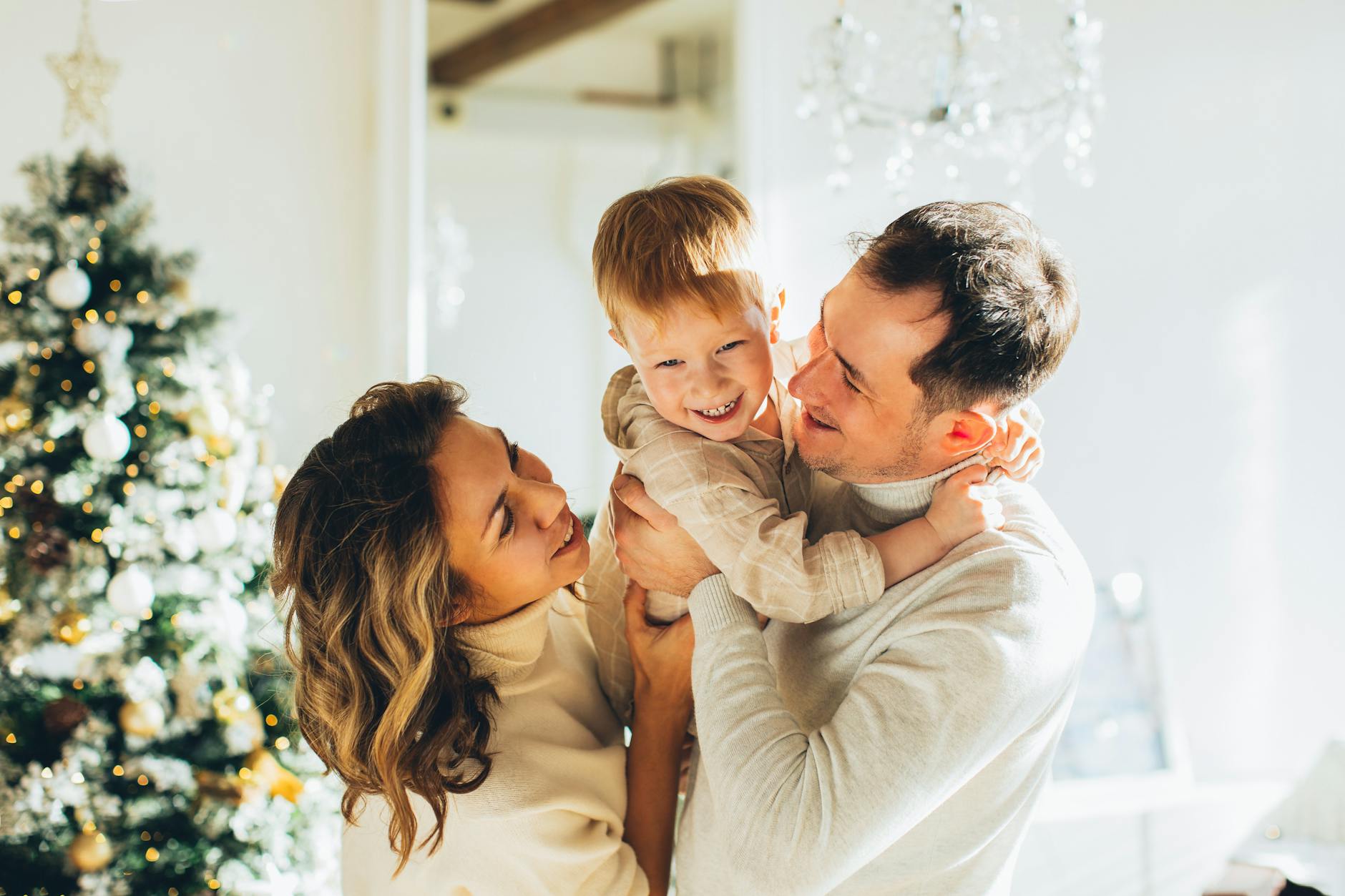 https://www.pexels.com/photo/couple-loving-their-kid-5859872/