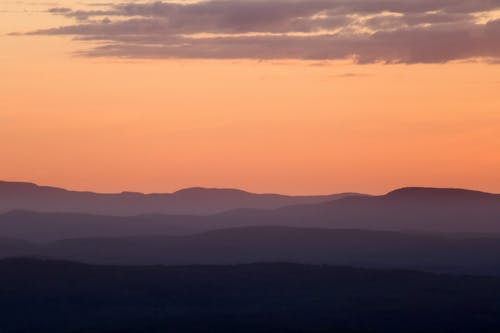 Безкоштовне стокове фото на тему «гори, Денне світло, Захід сонця» стокове фото