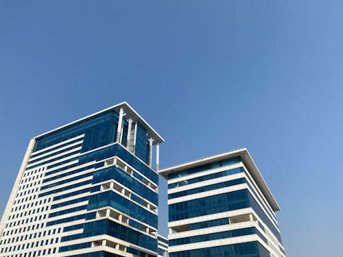 White and Blue Concrete Buildings