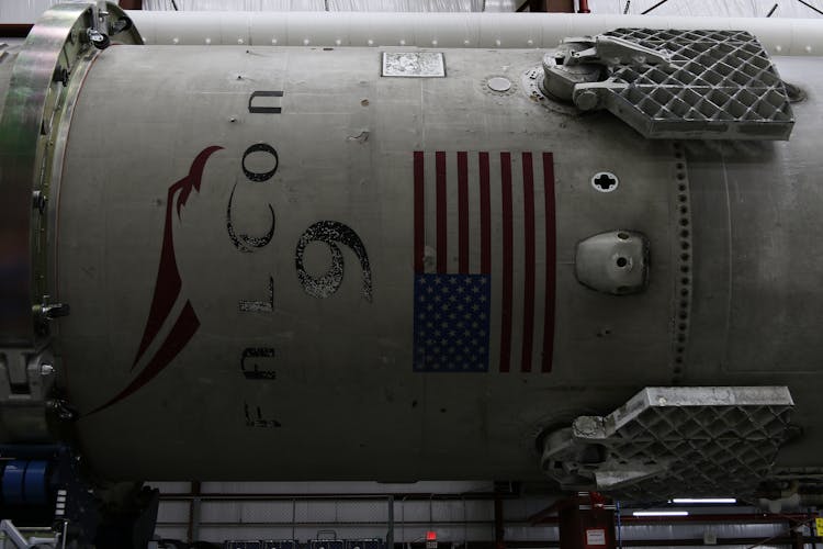 Spaceship Detail With American Flag In Hangar