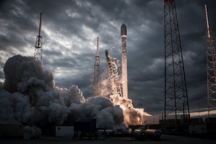 Space Rocket Taking Off On Overcast Day