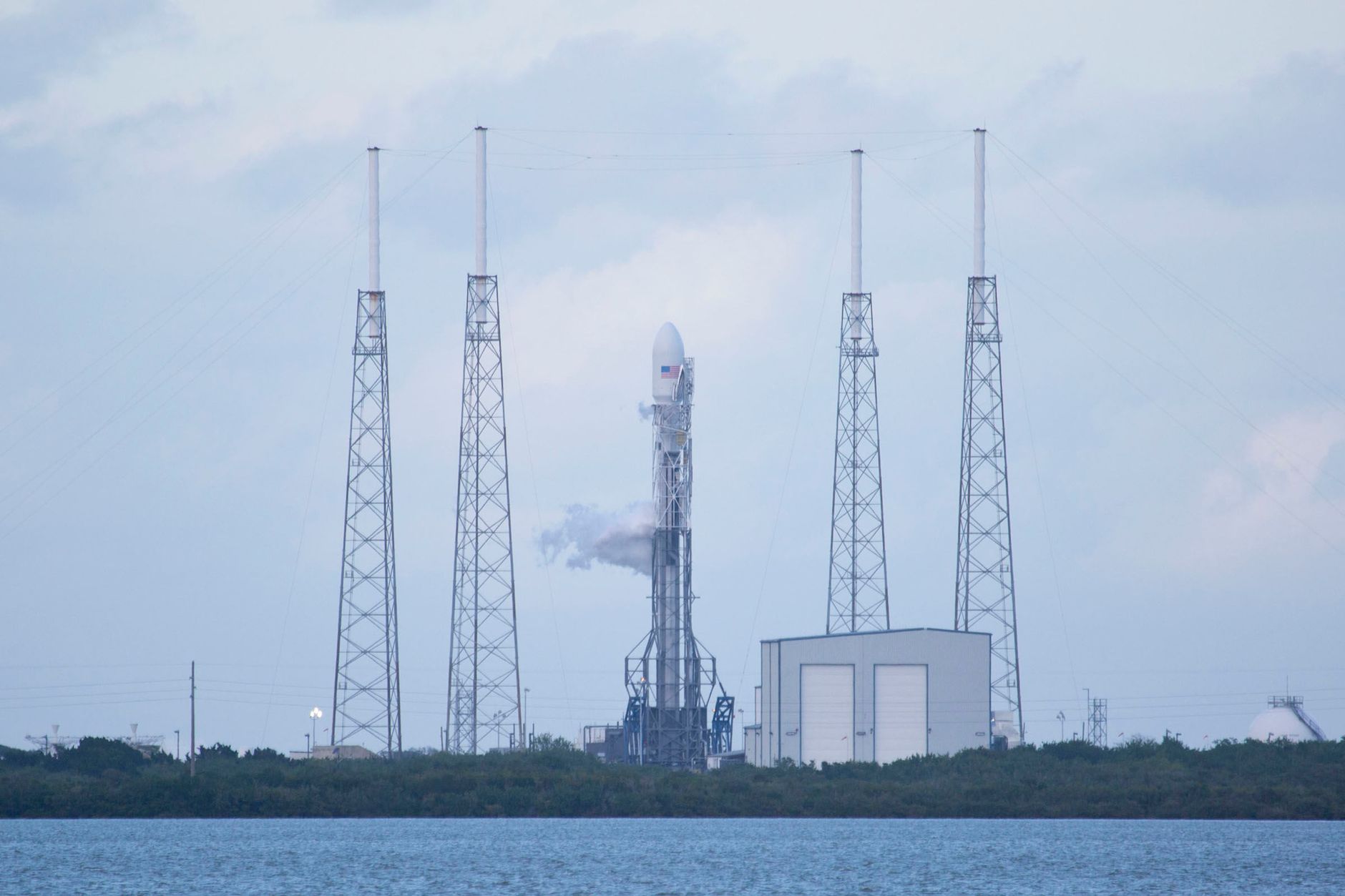 The Space Launch System (SLS) rocket with the Orion spacecraft atop, seen on Launch Complex 39B, awaiting the Artemis II mission. This integrated stack represents NASA's primary hardware for returning humans to the Moon.