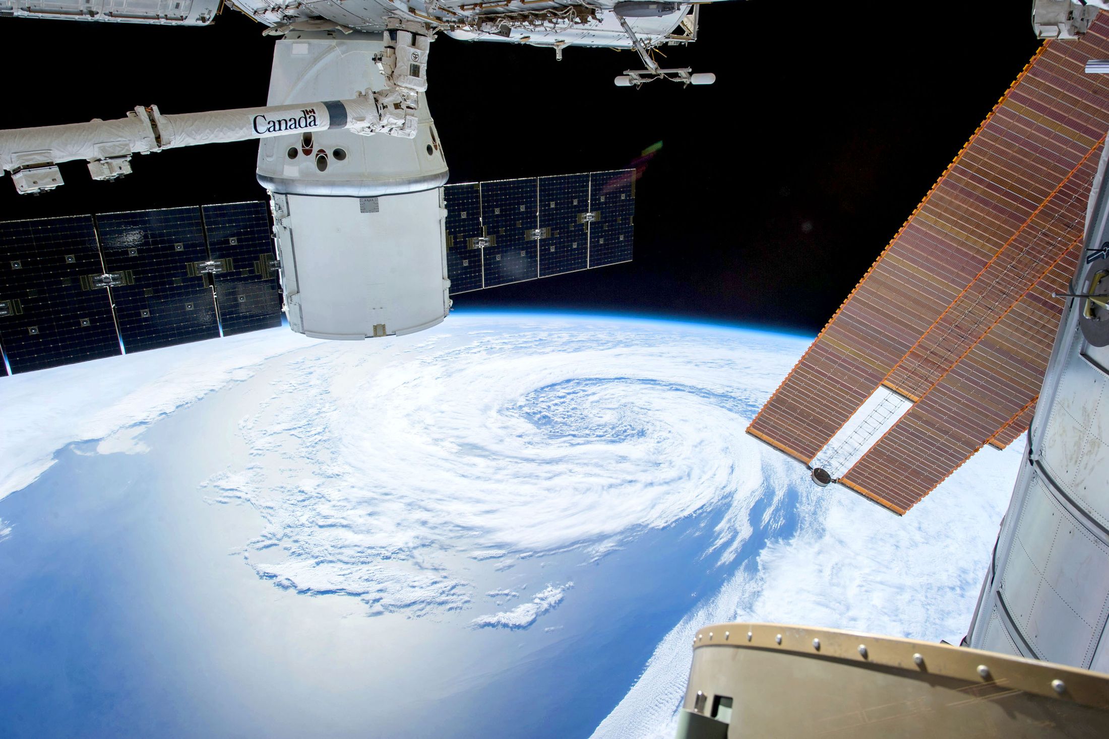 Context photograph: Earth viewed from an orbital space station with solar panels. Not a VIEWPIECE acquisition or analysis.