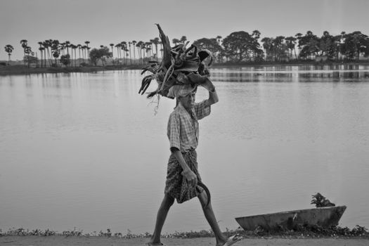 Grayscale Photo of a Man Working