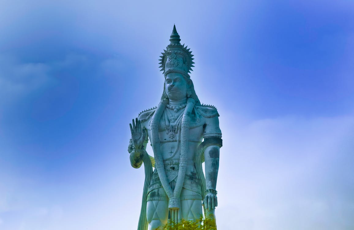 Green Statue of Liberty Under Blue Sky