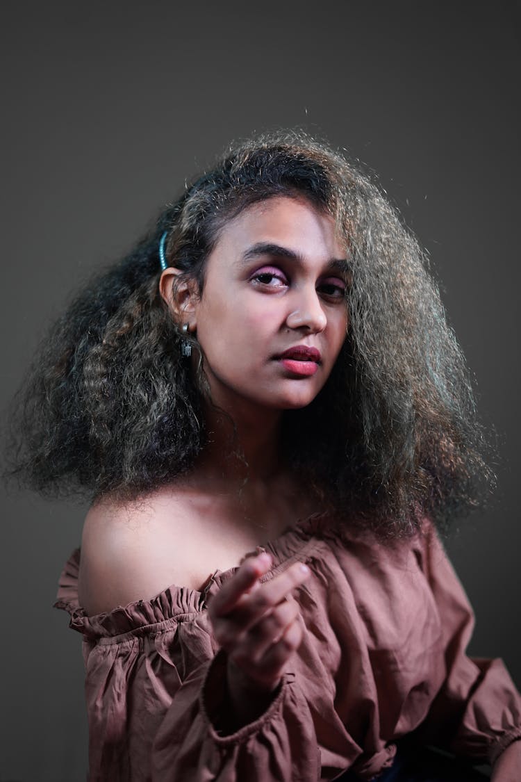 Portrait Of A Woman With Dyed Frizzy Hair 