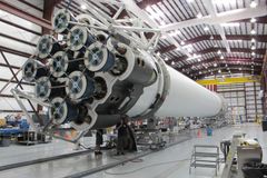 Low angle of innovative rocket core detail under construction at modern futuristic industrial factory