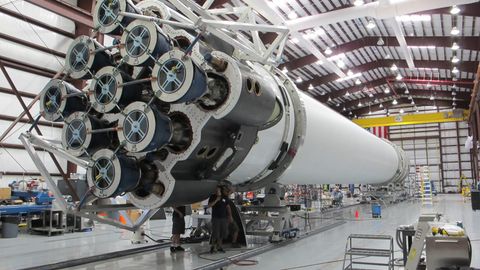 Low angle of innovative rocket core detail under construction at modern futuristic industrial factory