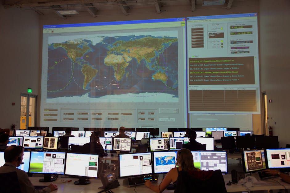 Expertos en sala de control de SpaceX aplicando observabilidad a datos de telemetría.