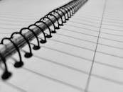 Spiral Notebook with Black Lines in Close Up Photography