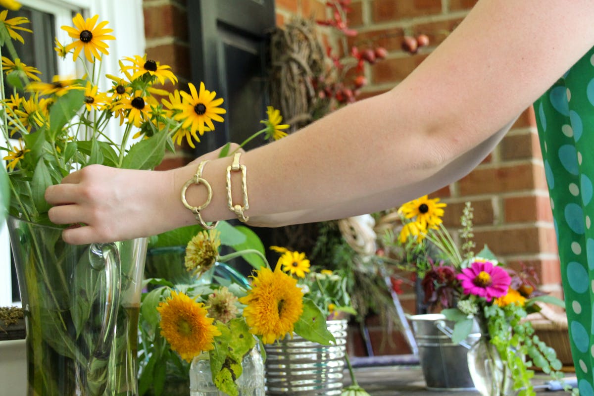 Researchers in a lab collaborating with data displayed on screens