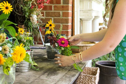 A Florist Making a Flower Composition 