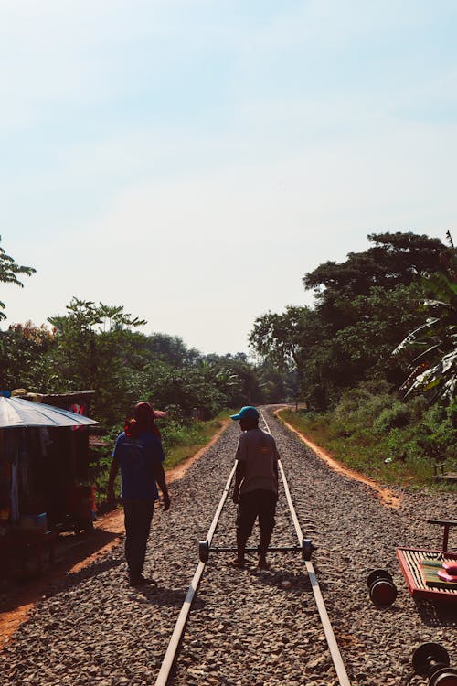 Two Men and Railroad Tracks