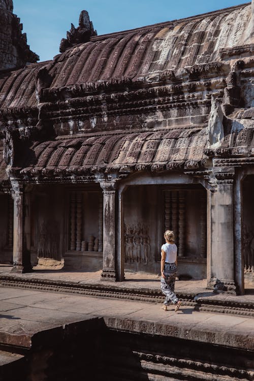 Tourist Walking in Angkor Wat Temple in Cambodia 