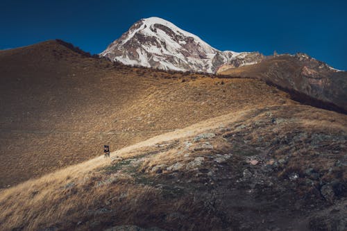 Snow Covered Mountain Under the Blue Sky