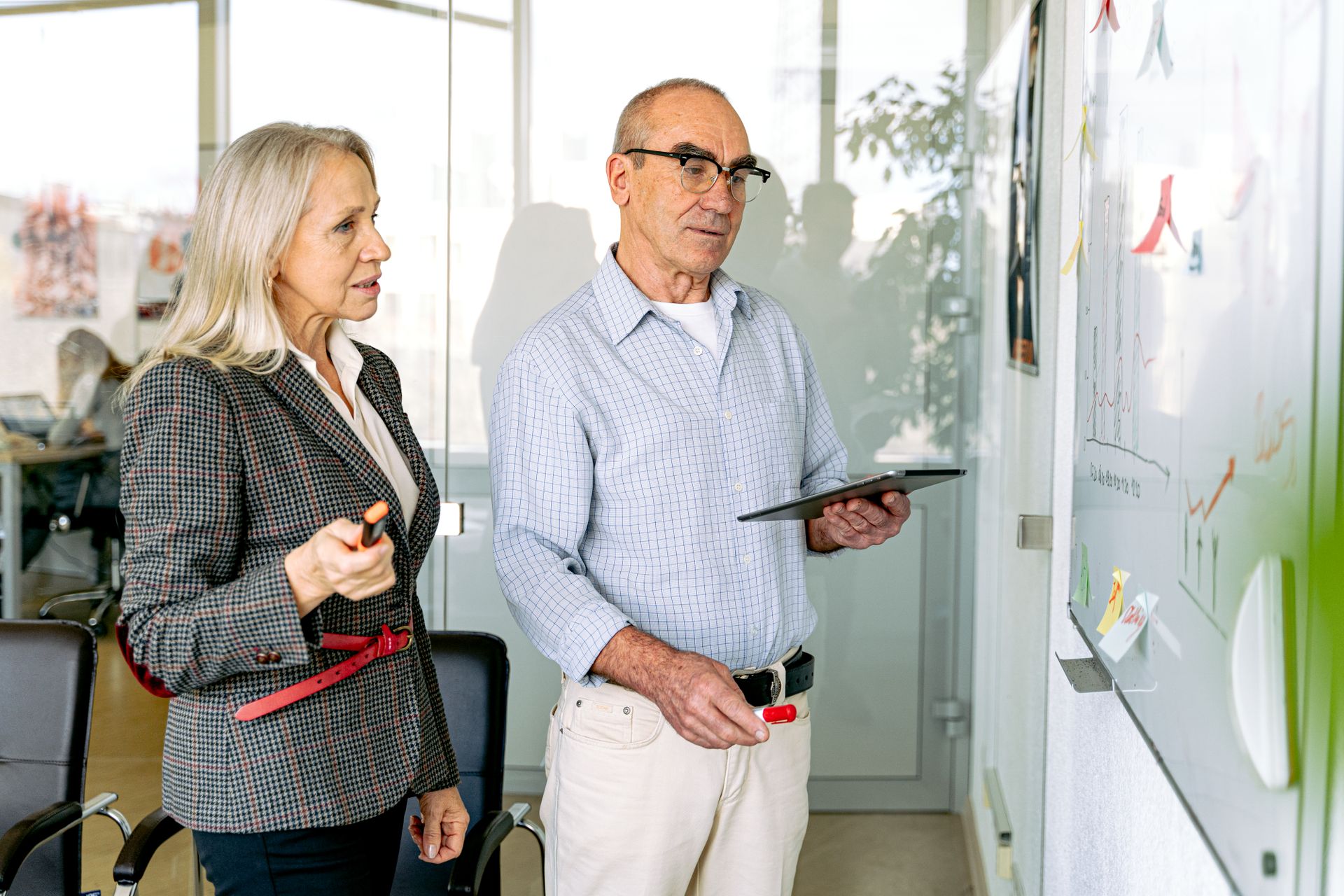 A Man and Woman Having a Meeting in the Office