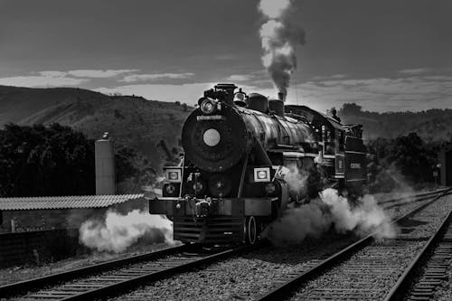 Grayscale Photo of a Steam Train