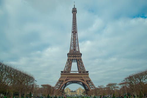 Photo of the Eiffel Tower Under a Cloudy Sky