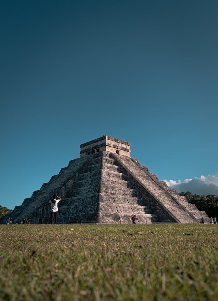 Photo Of The El Castillo Under A Blue Sky