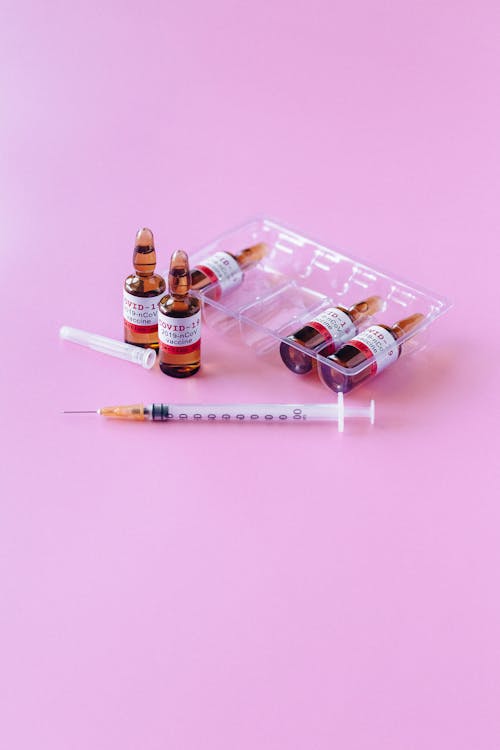 Free Covid-19 Vaccine In Vials Stock Photo