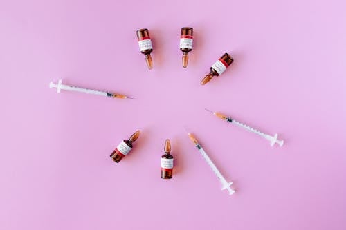 Free Flat Lay Of Covid Vaccines Stock Photo