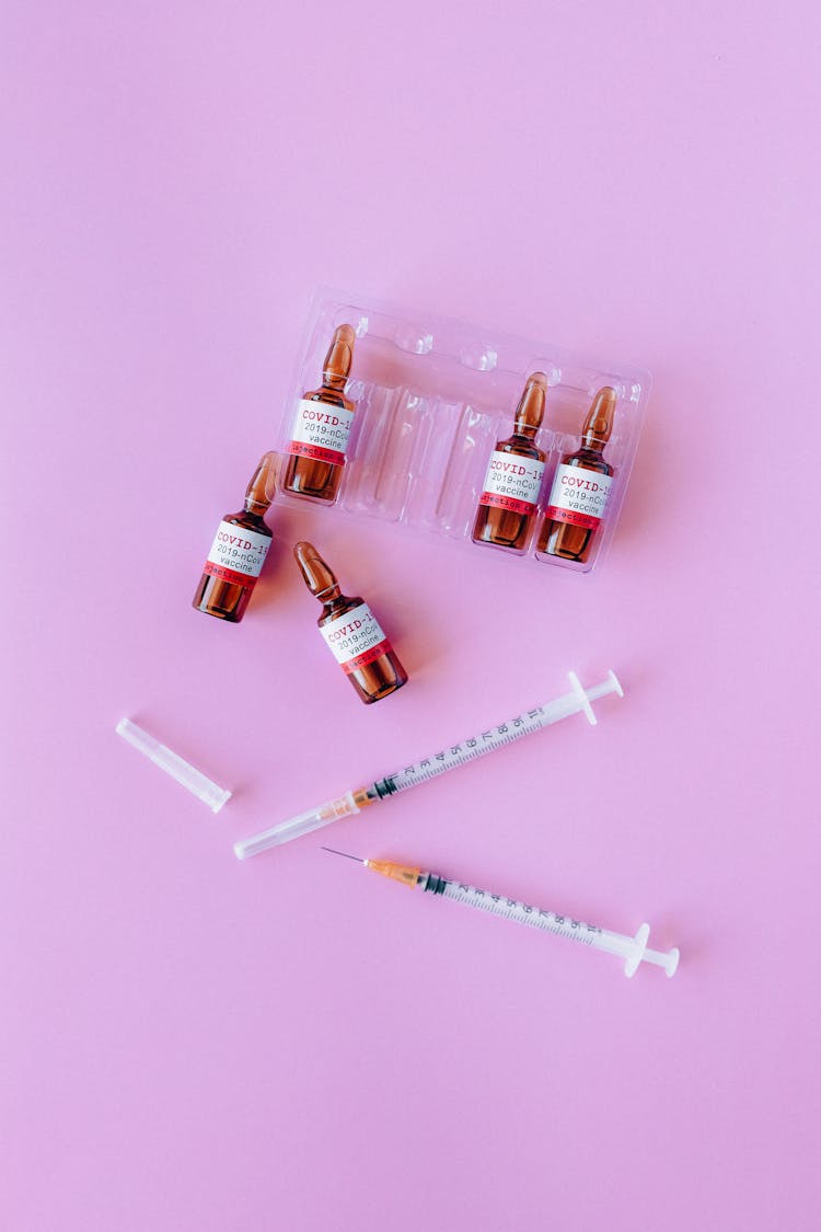 Flat Lay Of Covid Vaccine Vials