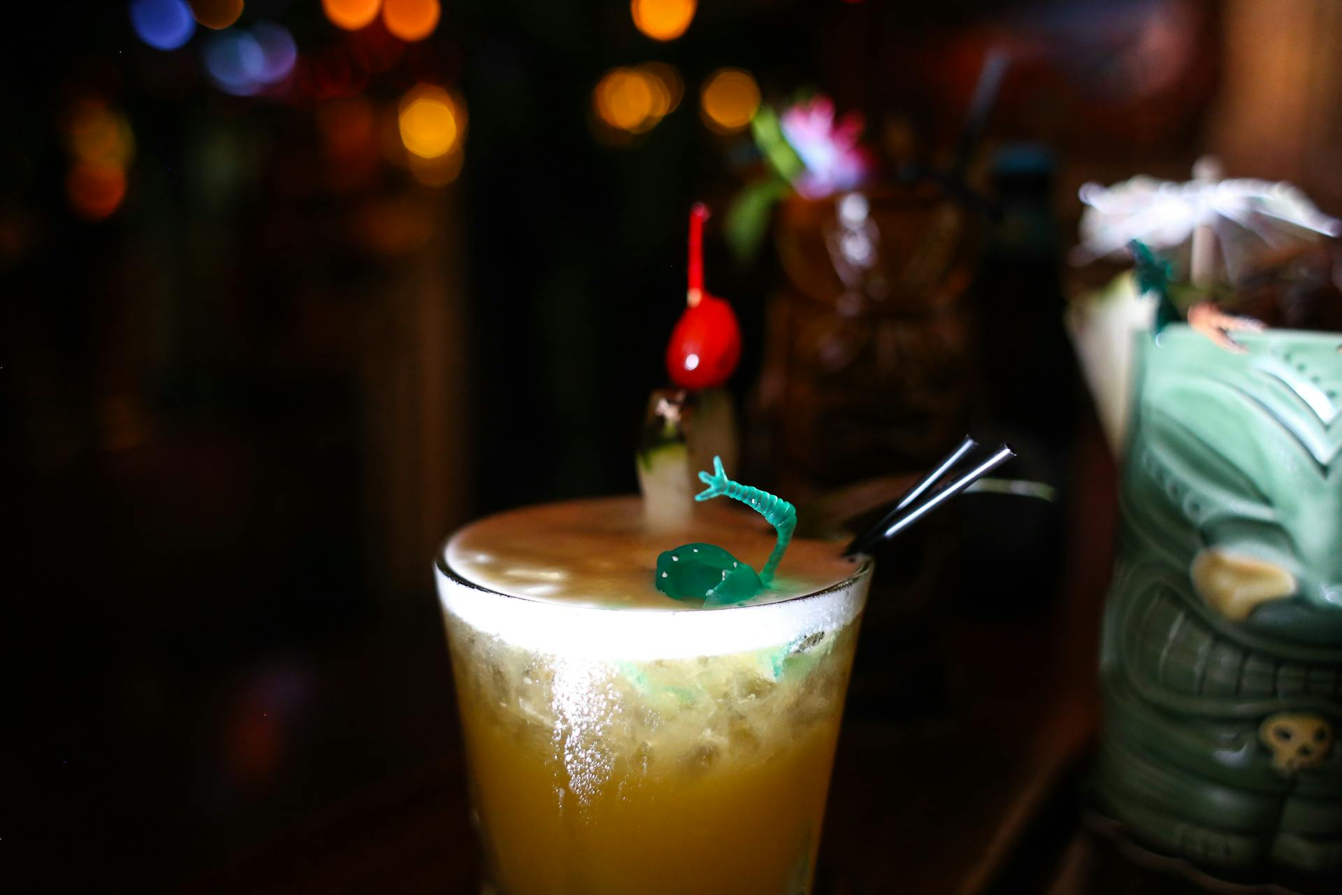 Clear Drinking Glass With Yellow Liquid in Close-up Photography