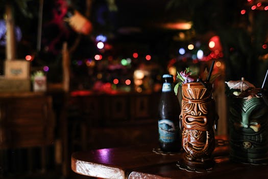 A vibrant tiki bar scene featuring exotic cocktails in tiki mugs with ambient lighting.
