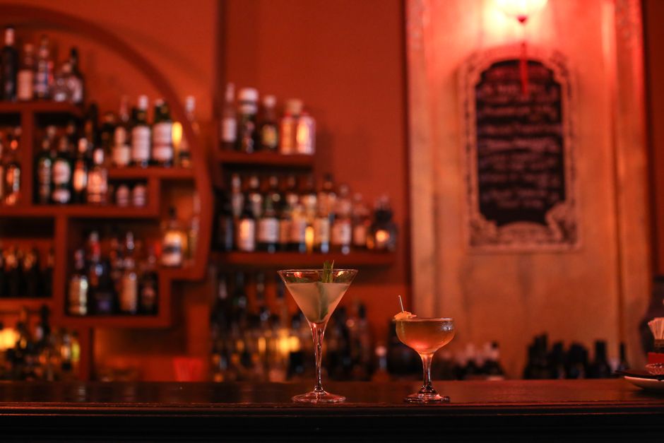 Trendy cocktail bar interior in Le Marais, Paris