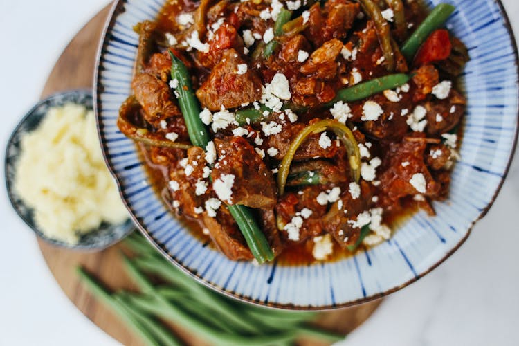 Chicken Based Dish Served In Bowl