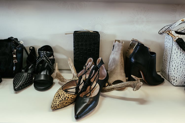 Close Up Of Women Shoes And Purses