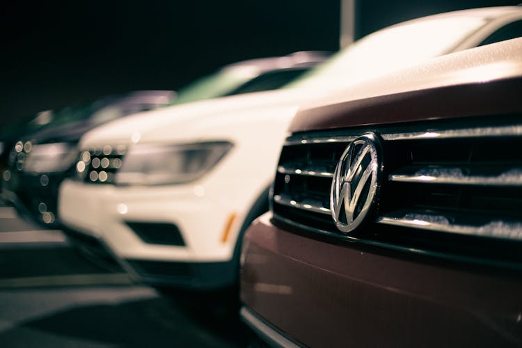 Row Of Shiny Vehicles On Parking Lot Of Car Market