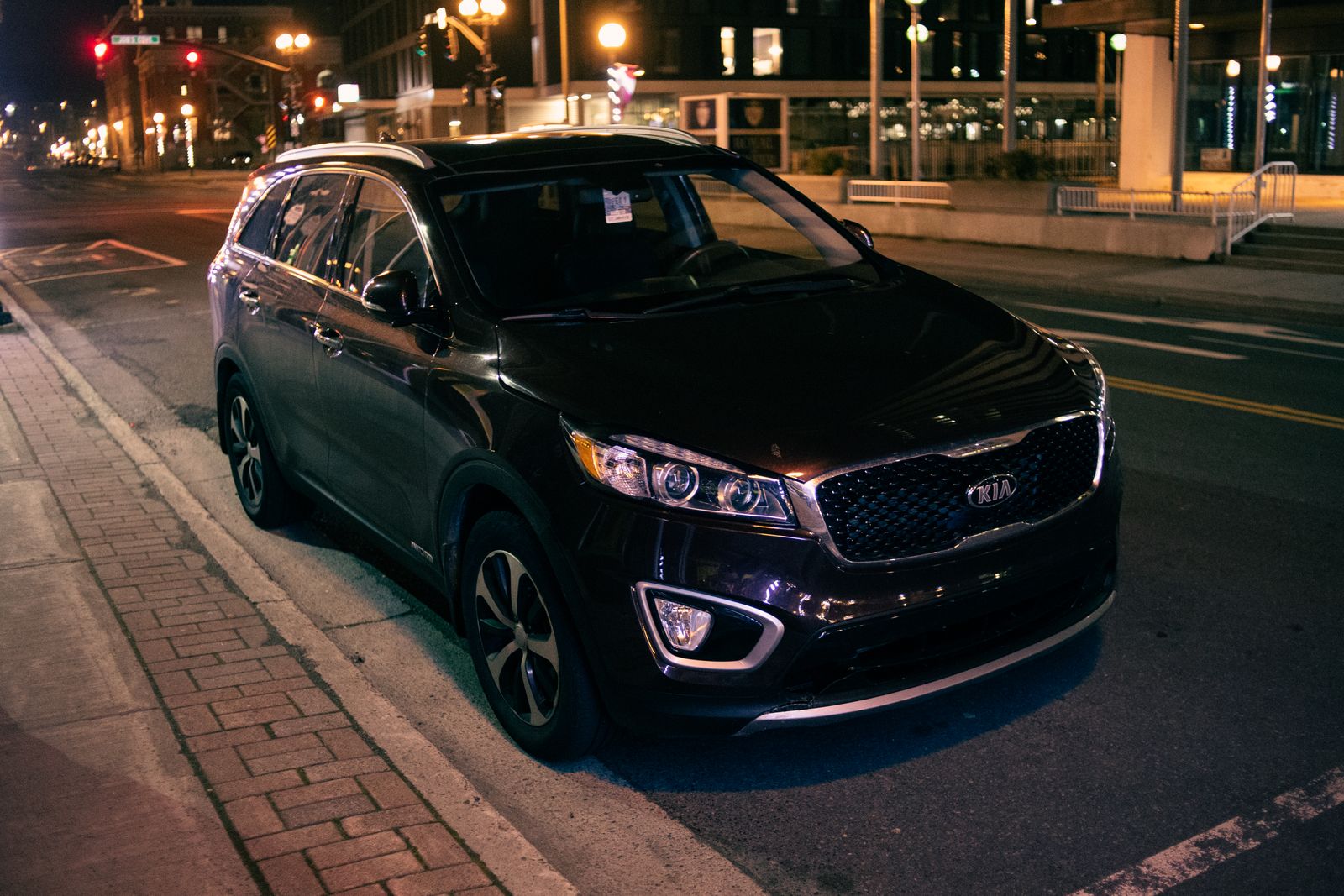 Black luxury vehicle at a luxury arrival