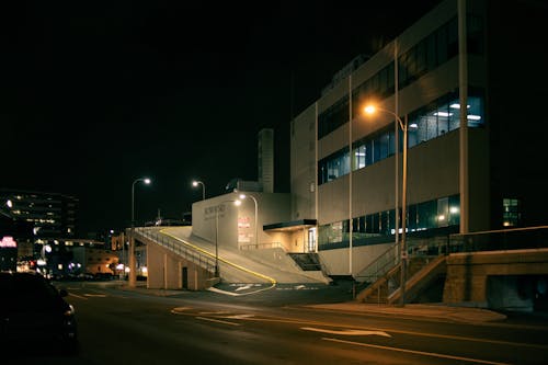 Road leading to building at night
