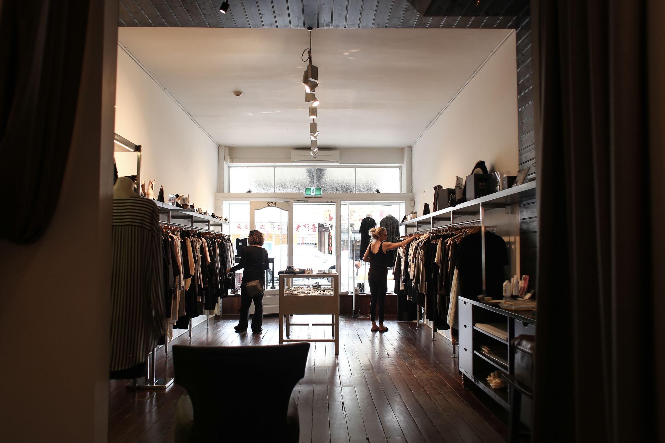 Customers browsing a stylish retail store