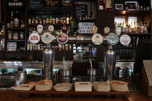 Close Up of Beer Taps in Pub