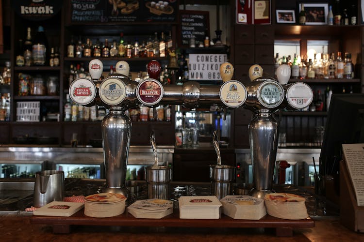 Close Up Of Beer Taps In Pub