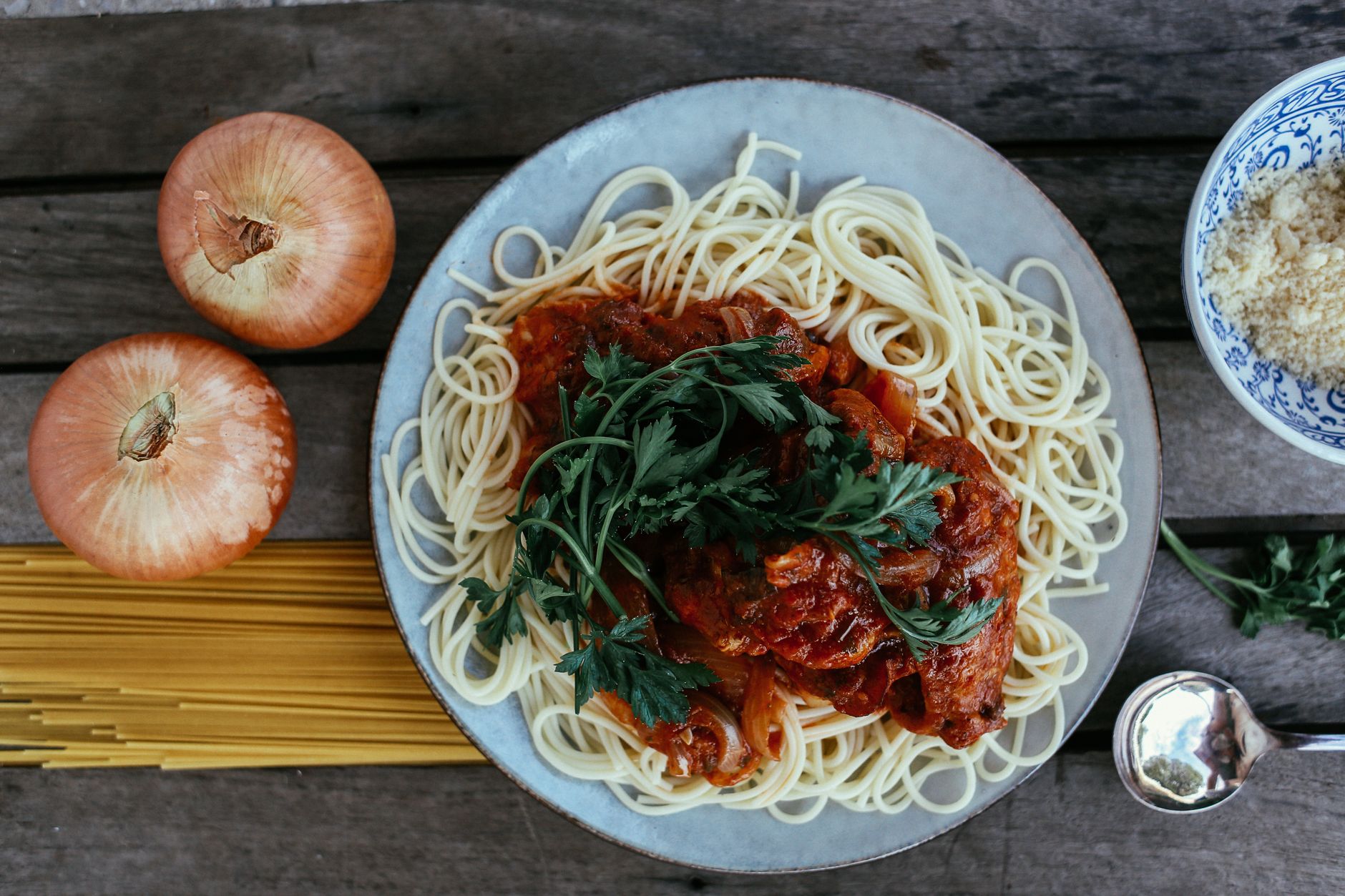 Braciole sliced on a plate with tomato sauce