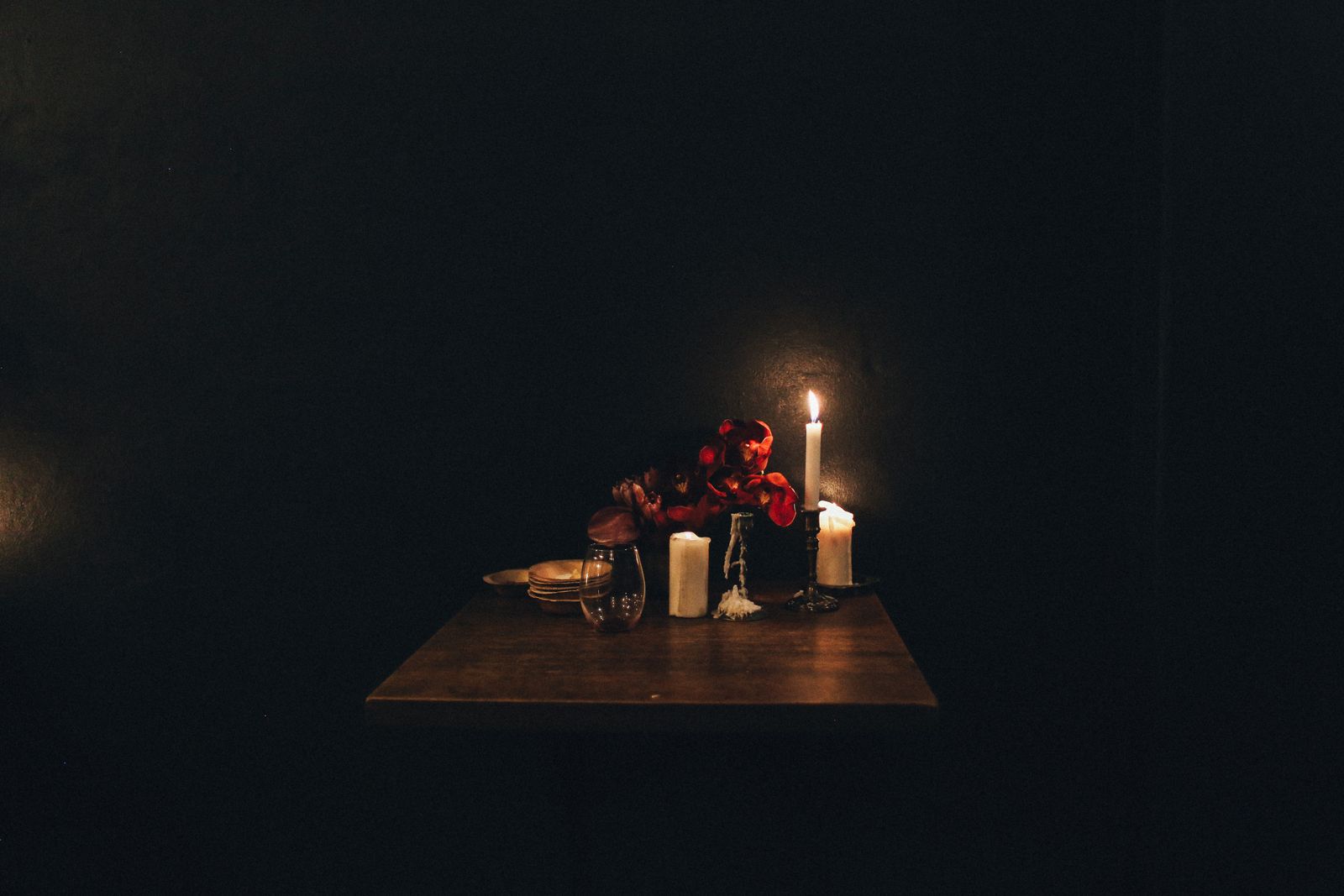 A soft, candlelit interior